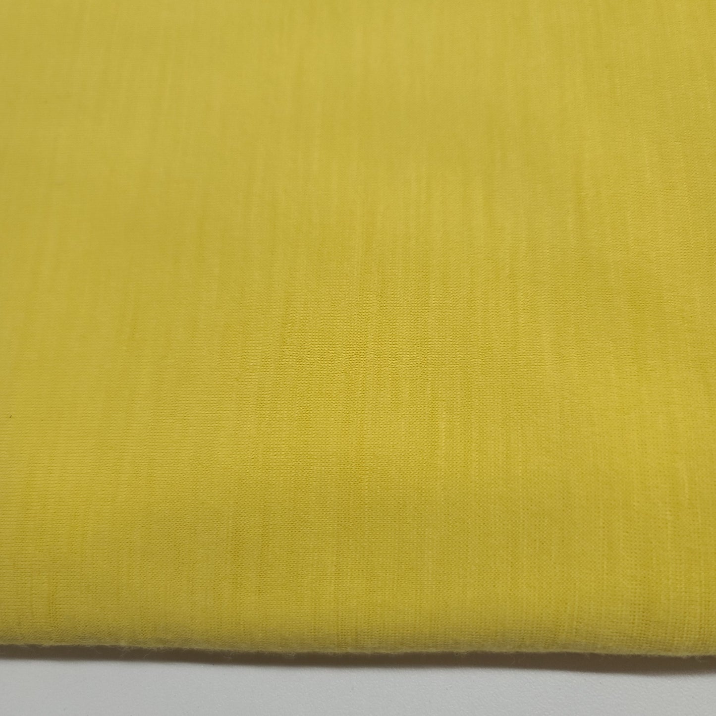 close up view of lightweight merino wool jersey.