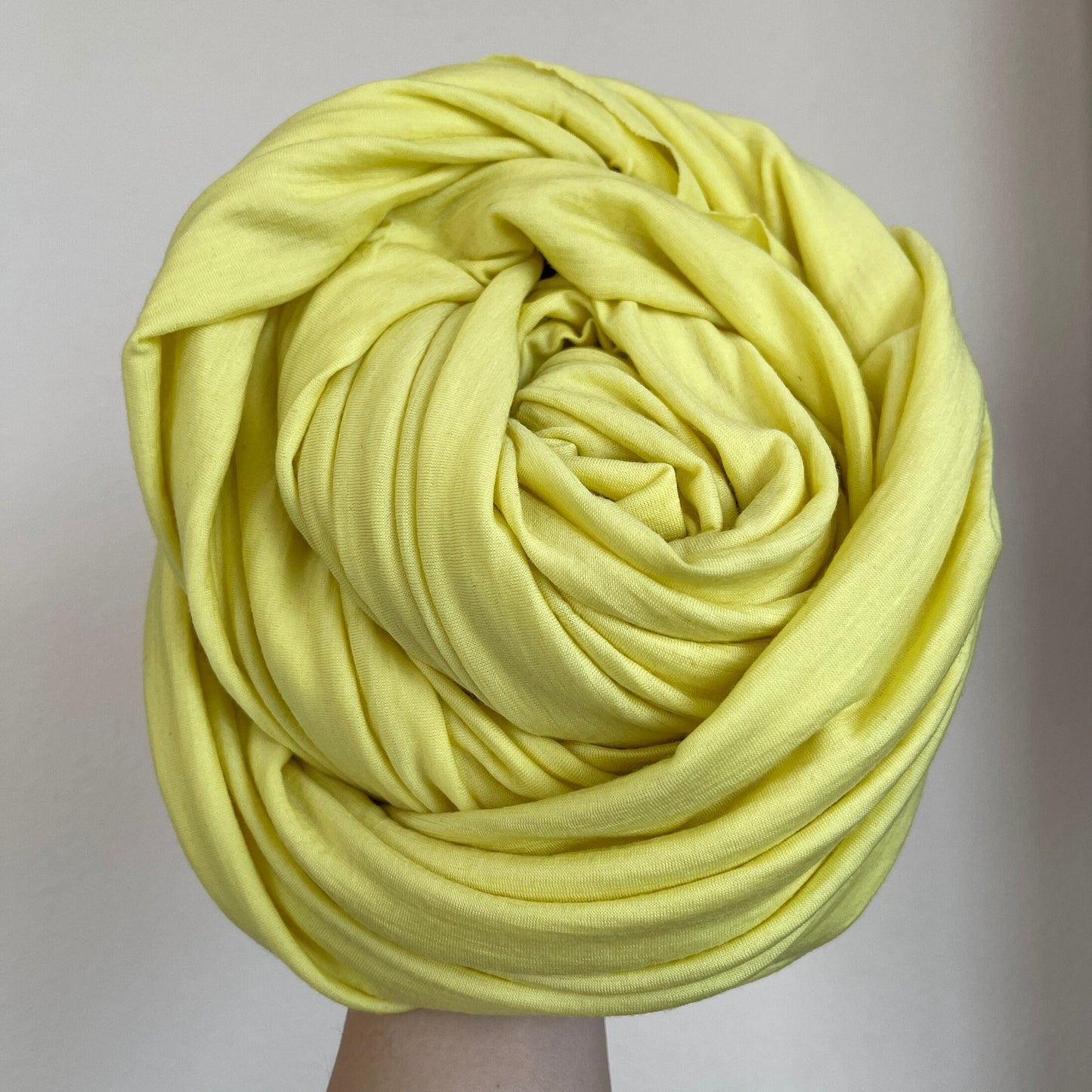 An alternative angle of merino wool holding under natural light.