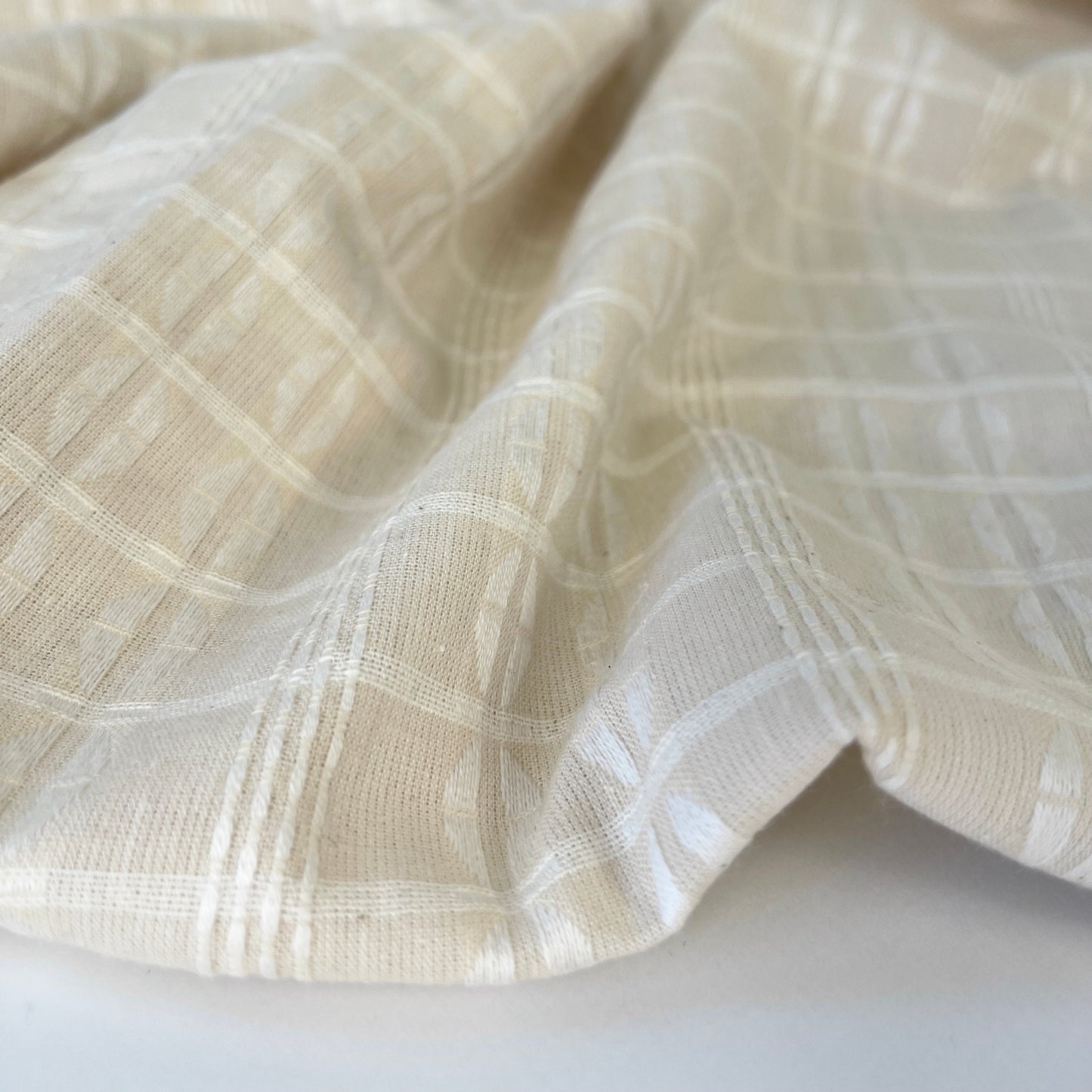 Engineered jacquard cotton woven fabric.