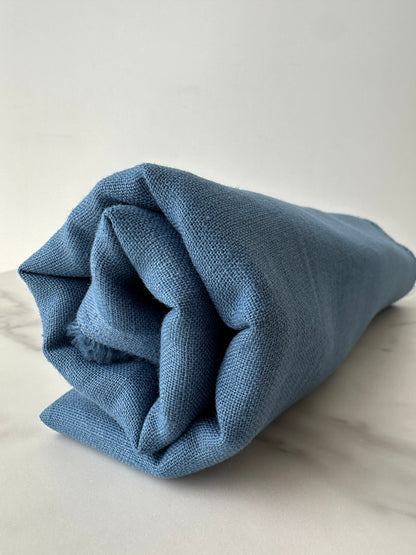aegean blue linen fabric drape in natural light medium weight