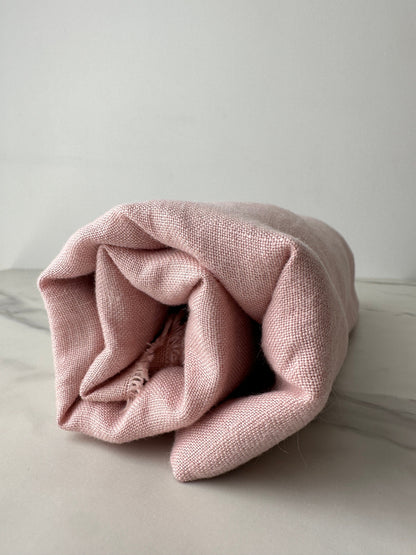 pastel blush pink linen fabric in plain weave texture