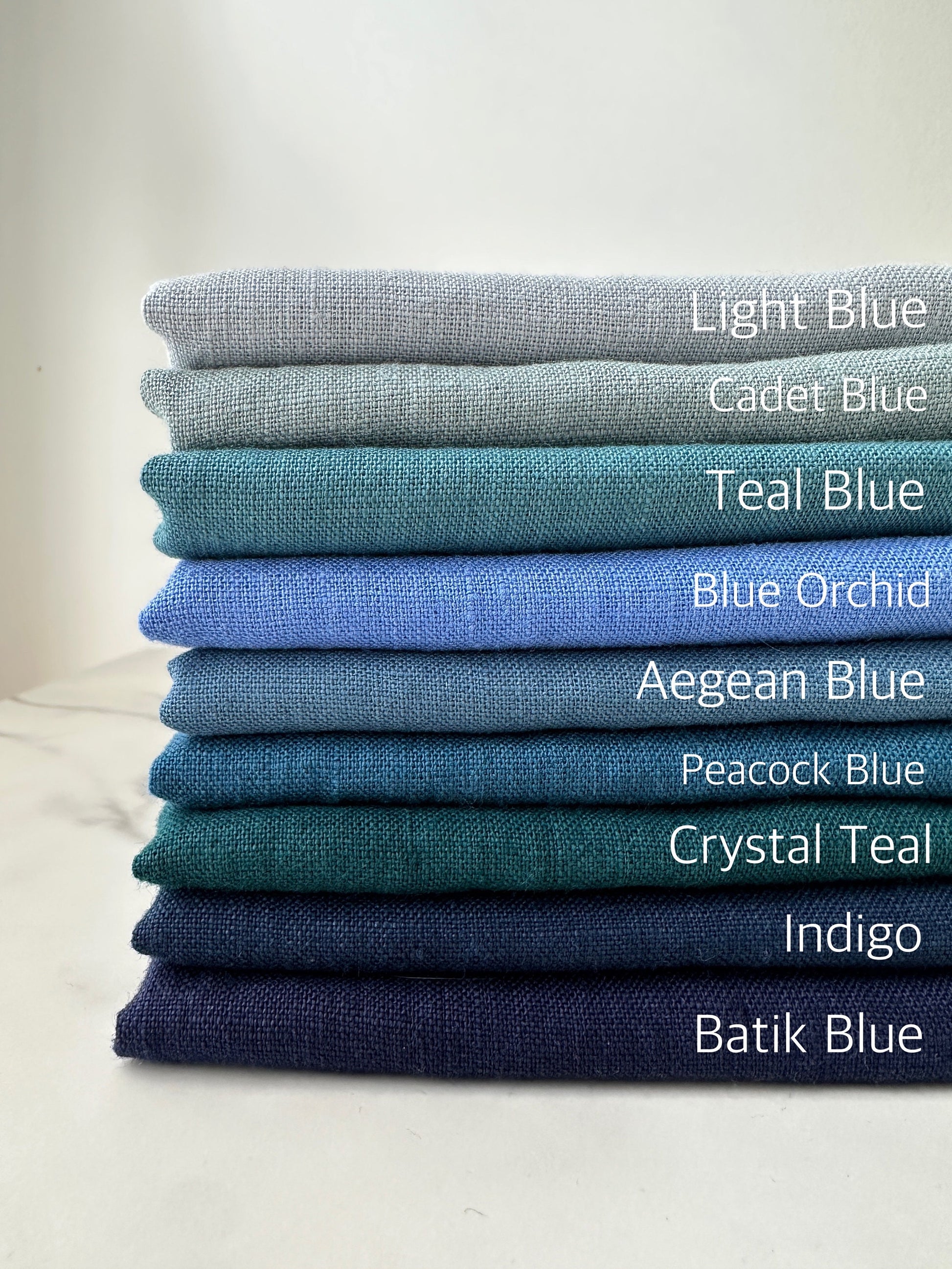 blue tones linen fabric by the yard for sewing home decor projects and resort clothing