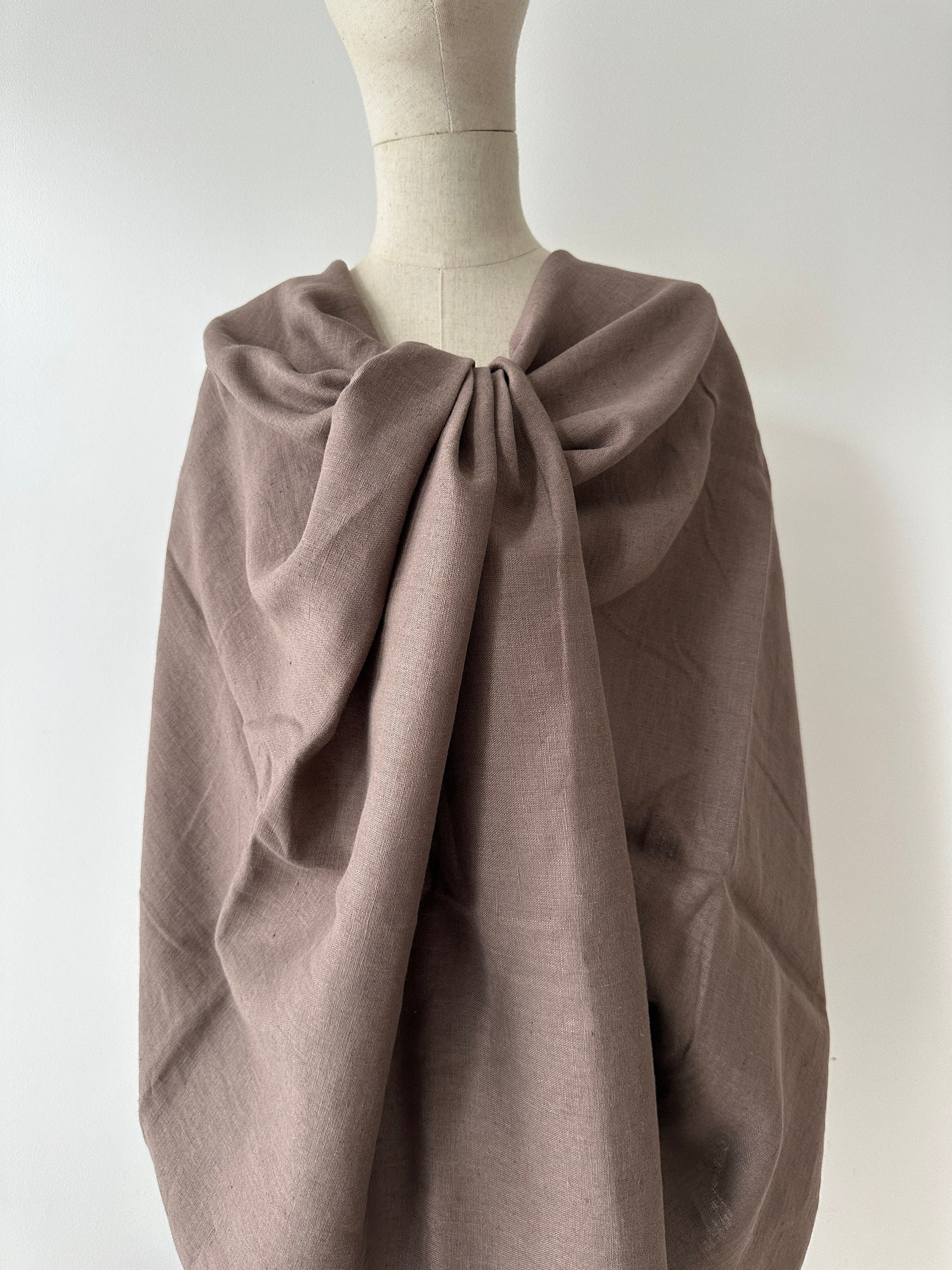 a statement dress in taupe linen fabric