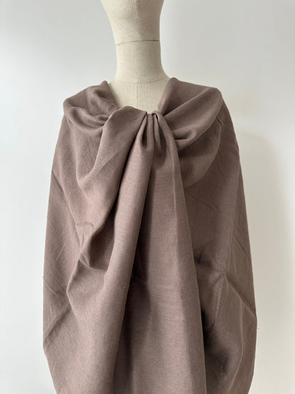 a statement dress in taupe linen fabric