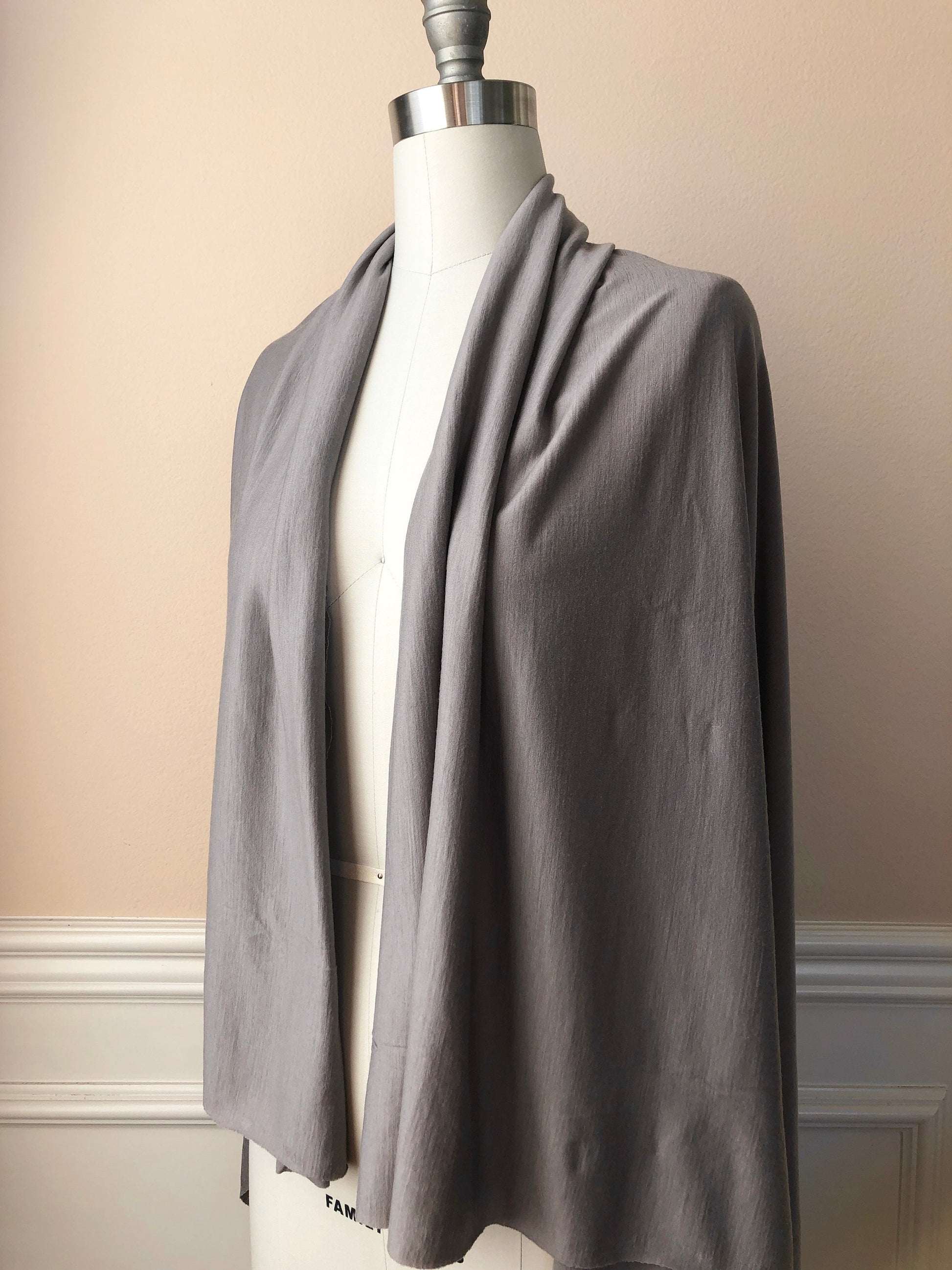 Plush merino wool textlie on dress form as a light jacket.