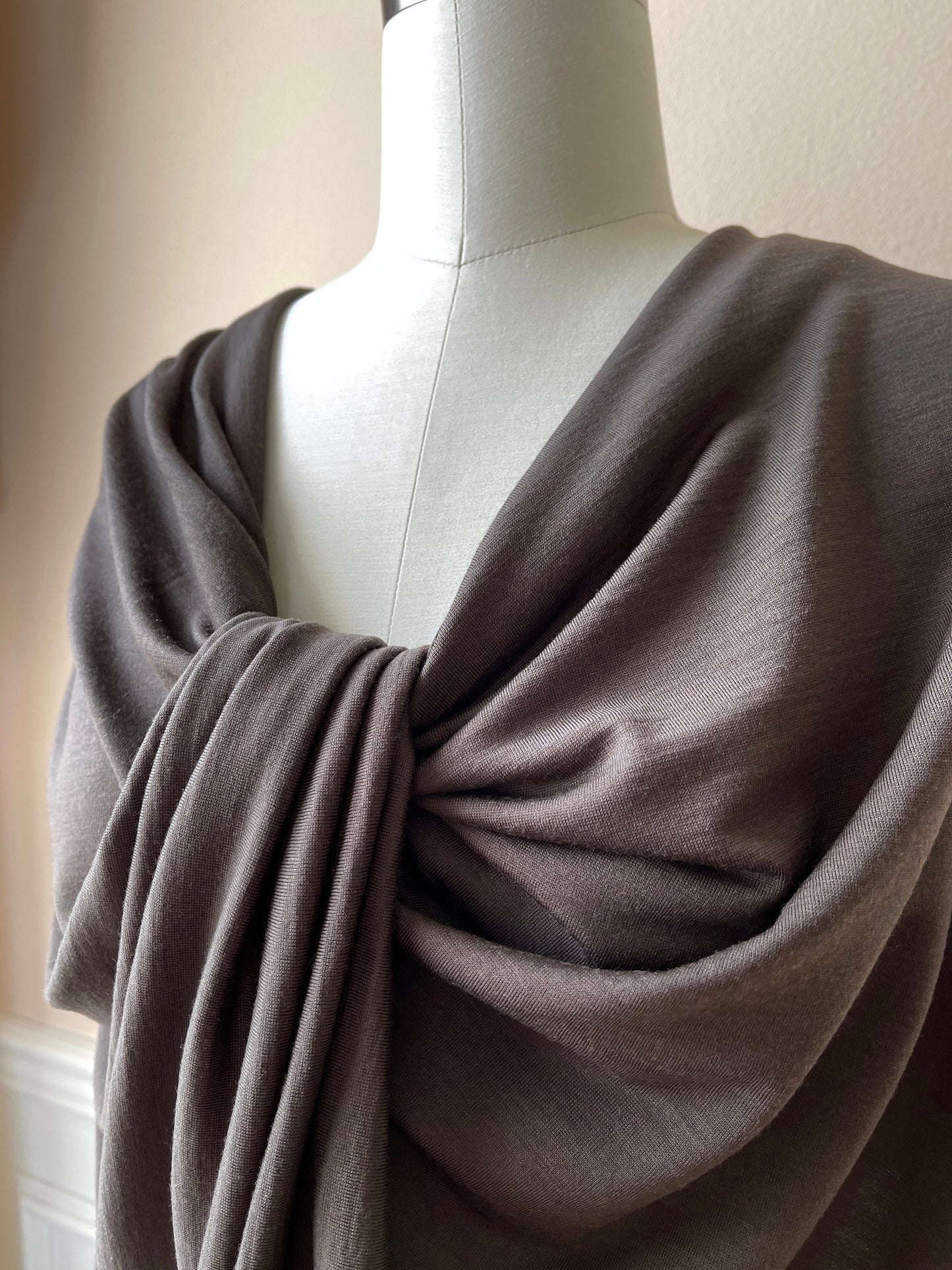 Luxuriously soft merino wool fabric in neutral color for premium comfort.