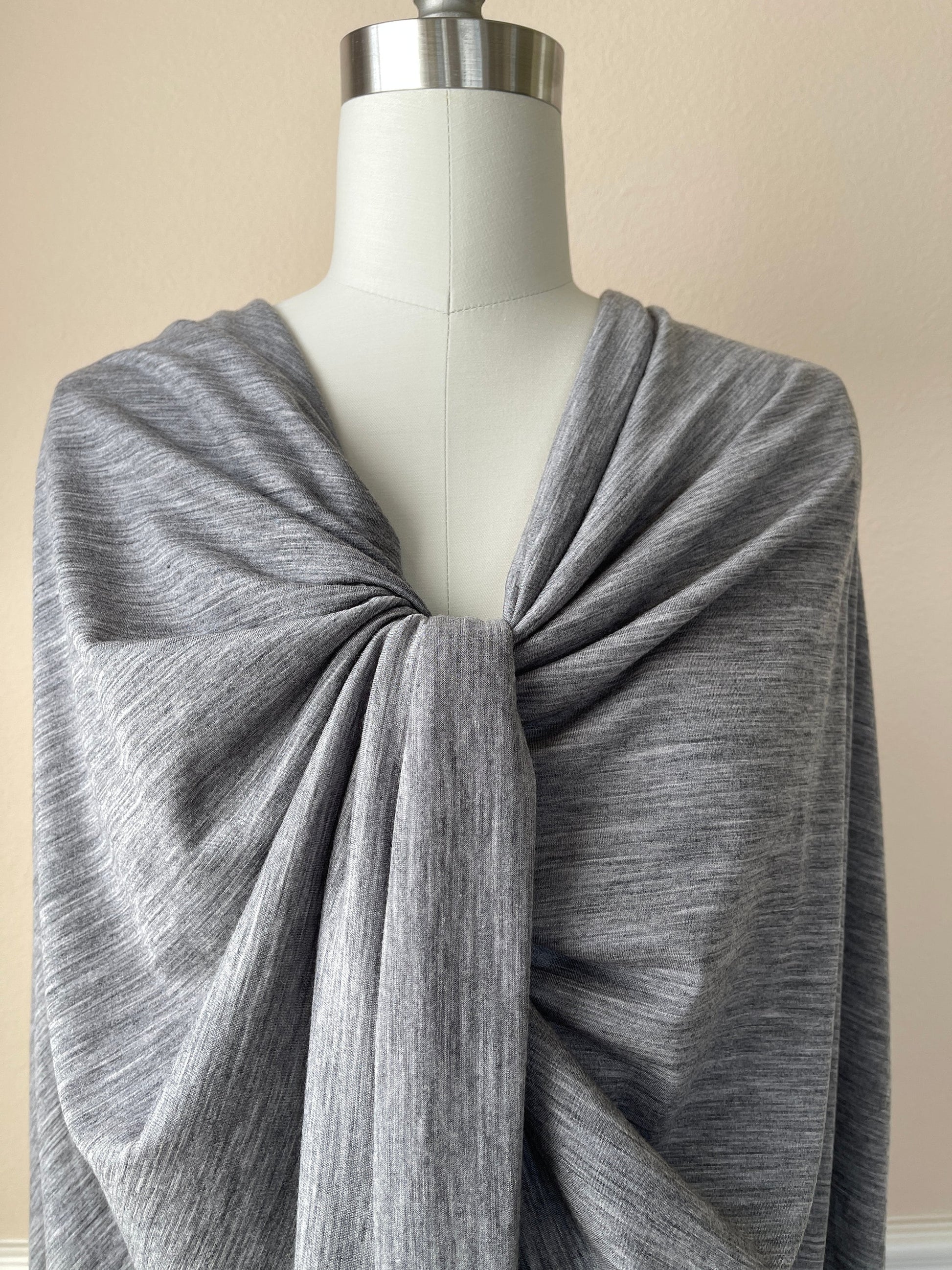 100% natural merino wool plain knit jersey fabric on mannequin.