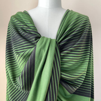 Soft and breathable green merino wool stripe jersey fabric for stylish tops