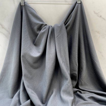 nsulating merino wool fabric in gray color provides warmth.