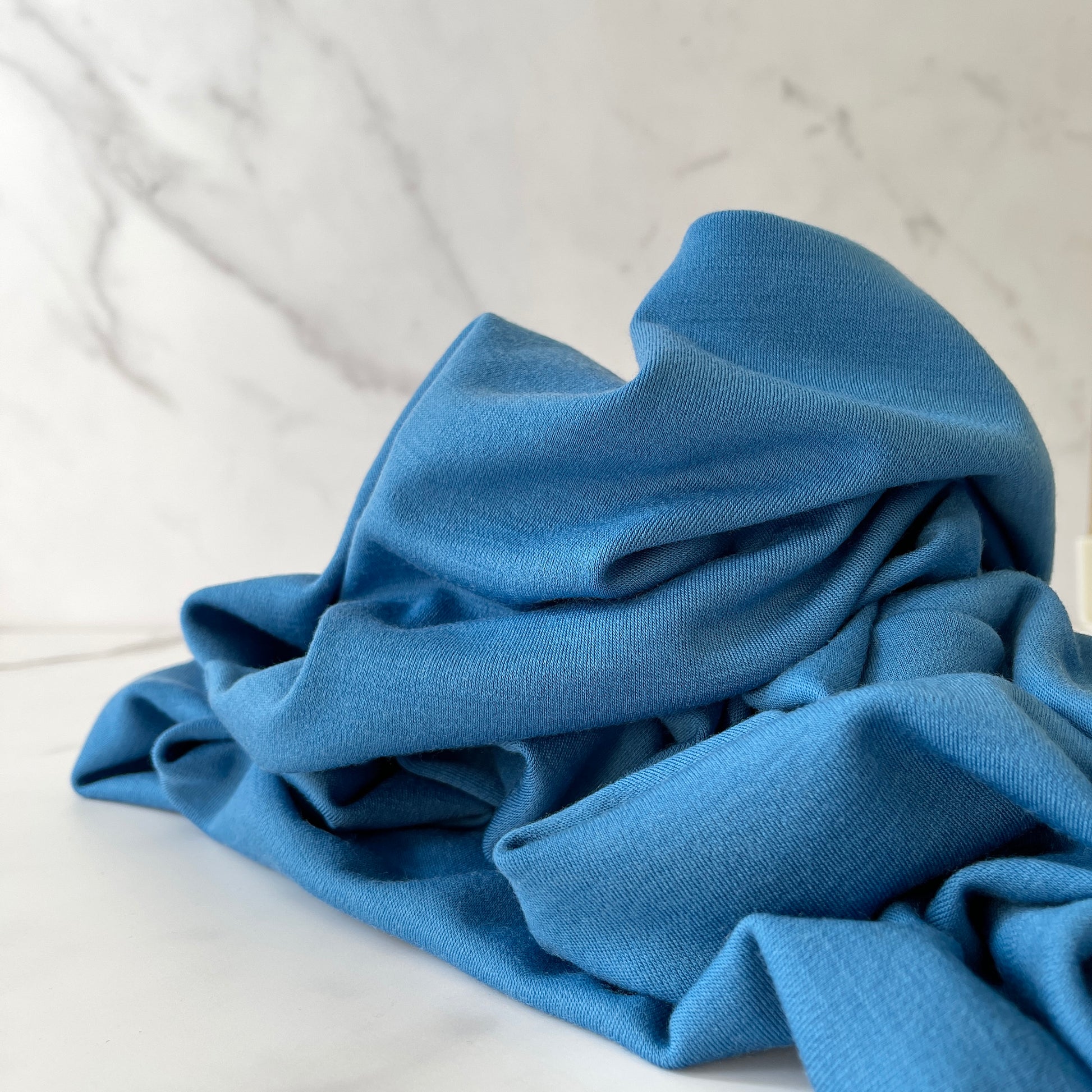 Odor-resistant merino wool fabric in blue stays clean and fresh