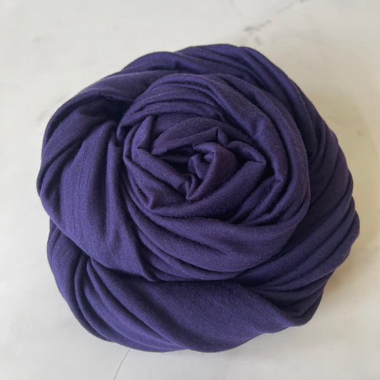 Innovative yarn dyed merino wool in heather  black and blue color.