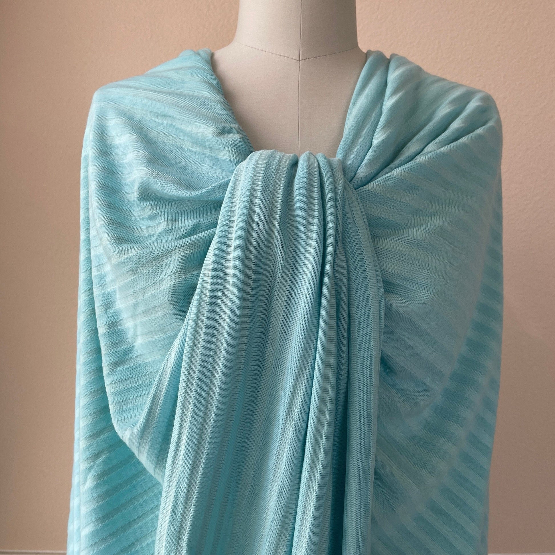 Versatile merino wool stripe fabric in Tiffany Blue.