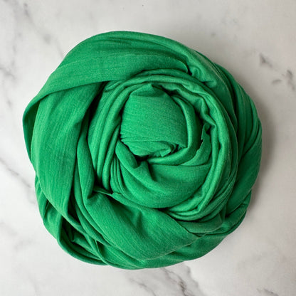 Climate control merino wool fabric in green color.