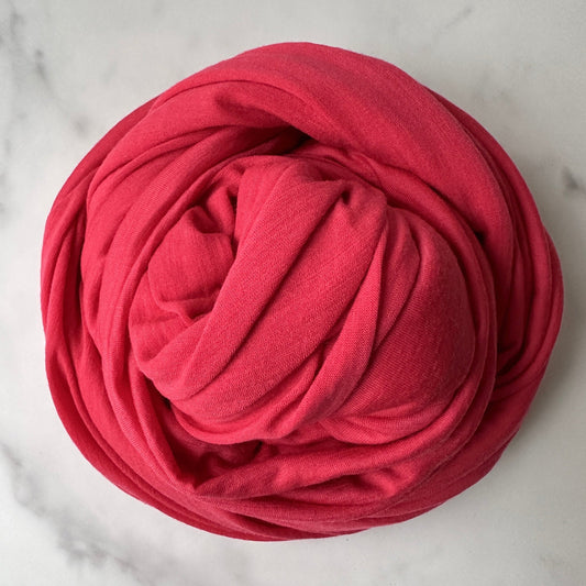 Luxury Merino Wool Fabric in a rich geranium floral hue.