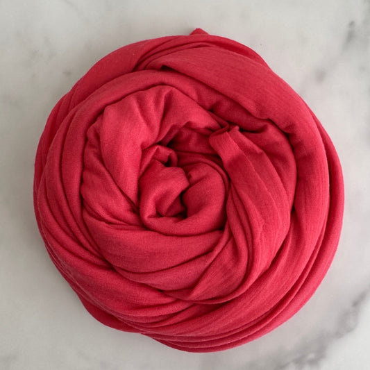 Durable merino wool fabric in Vermilion hue. 