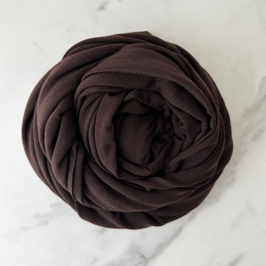 Experience natural insulation with our merino wool fabric in Burnt Chocolate Brown color.