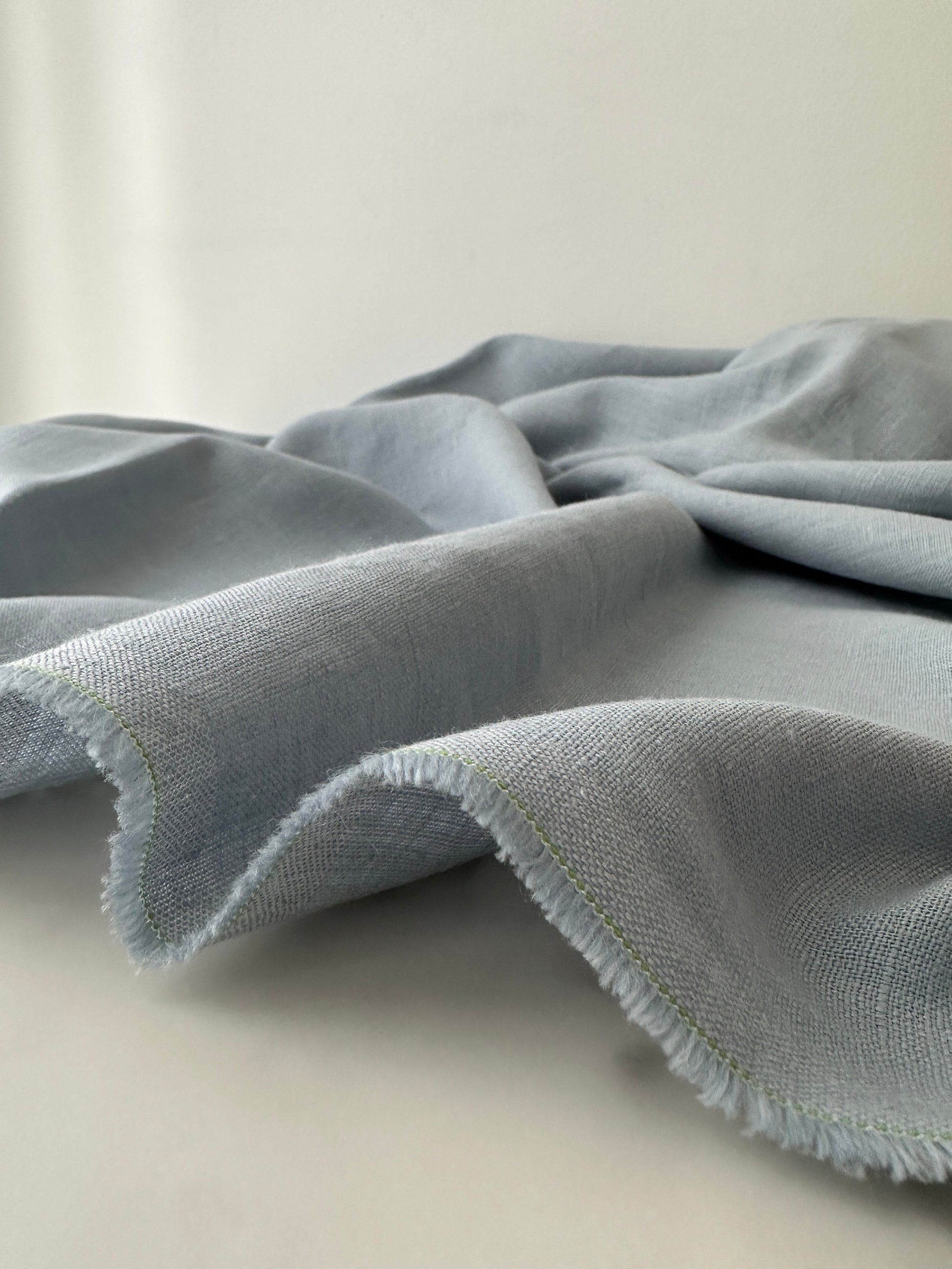 light blue linen fabric perfect for bedding and soft furnishings