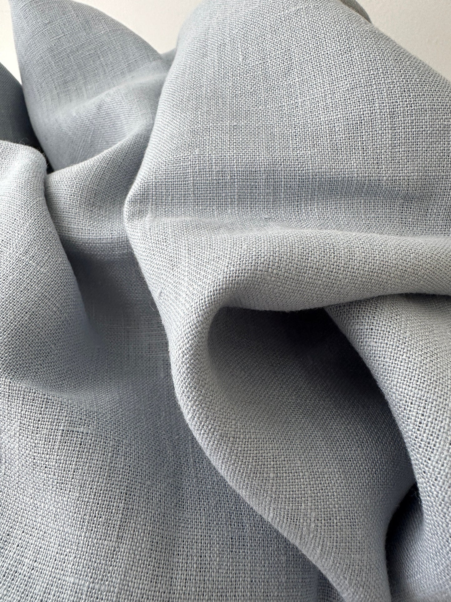 light blue linen fabric perfect for bedding and soft furnishings