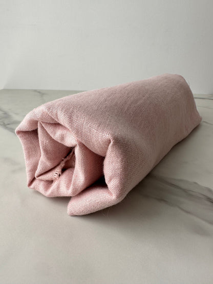 poetic light pink fabric display on table