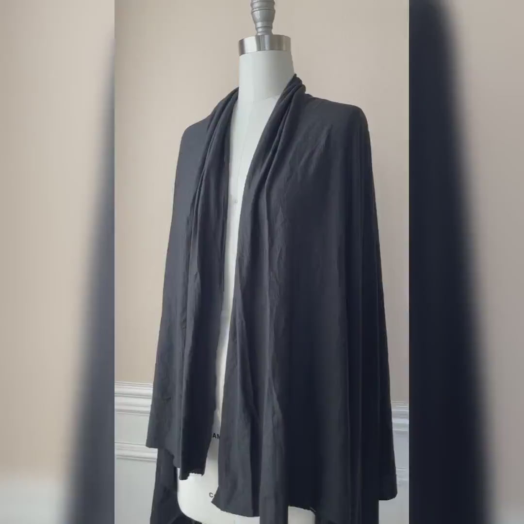 Video capturing classic true black merino wool fabric.