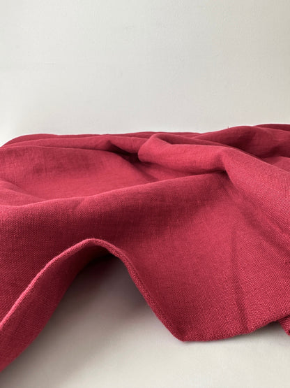 red garnet linen fabric side view showing colro depth