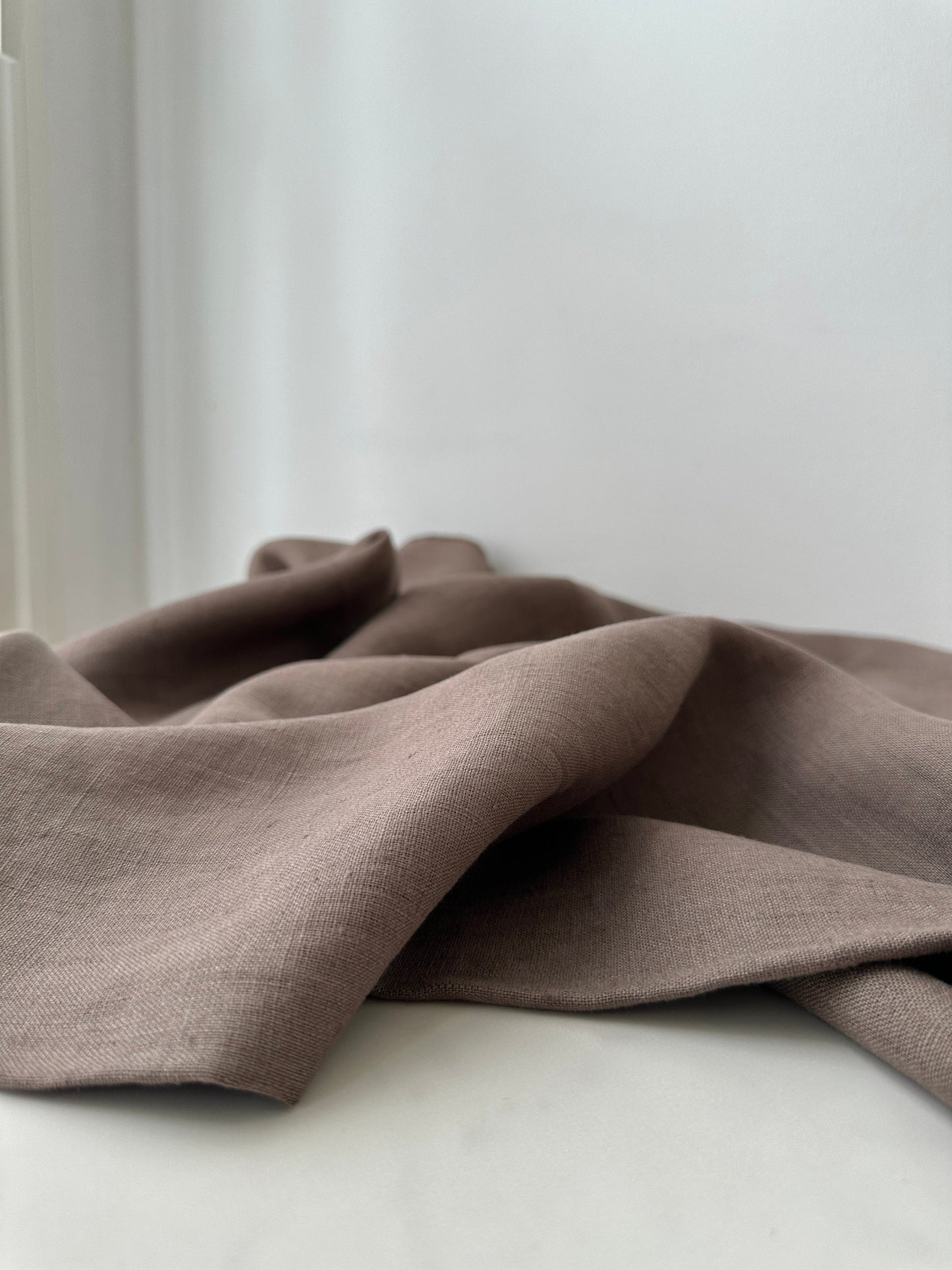 taupe linen fabric close up 