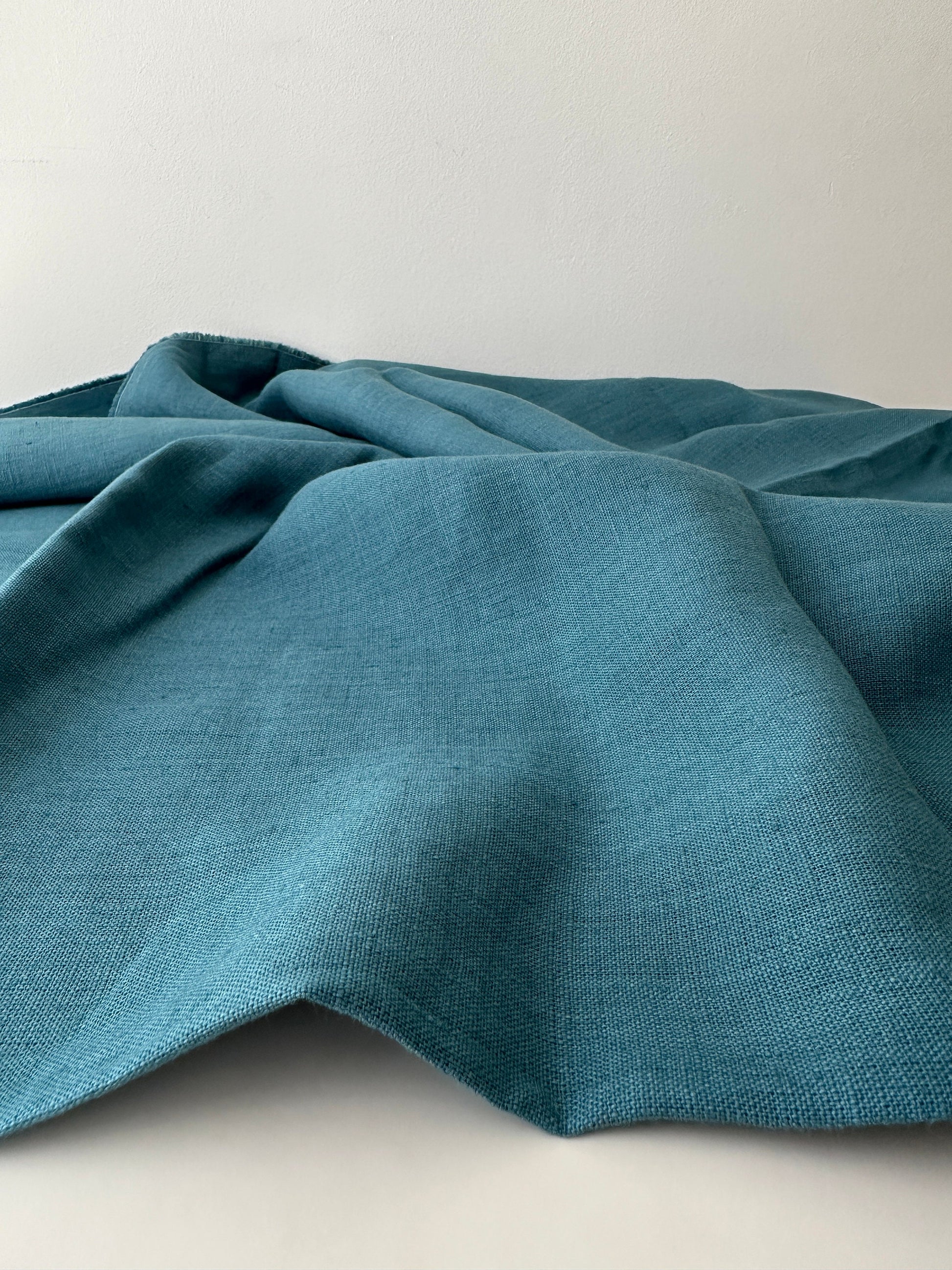 teal blue linen fabric ideal for curtains and drapery use