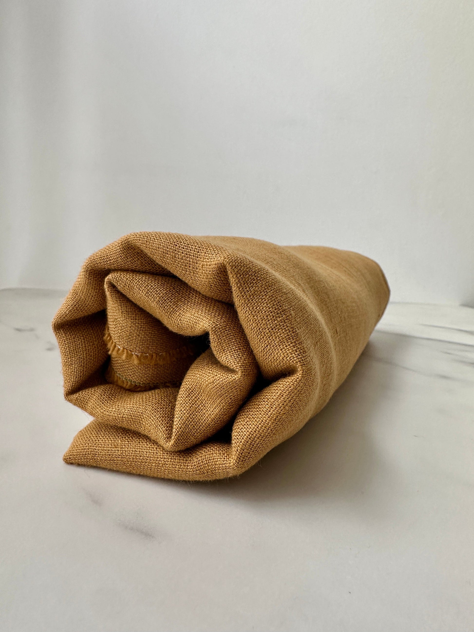 toffee caramel color linen fabric side view to see color depth
