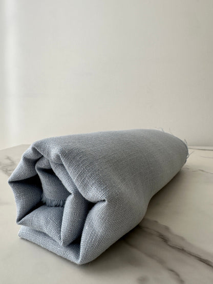 washed light blue fabric showing slub detail